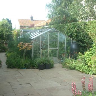 Paved area and planting in Catfield