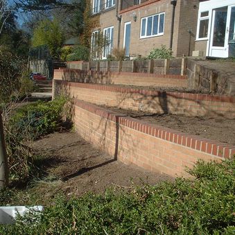 Retaining walls used to construct raised planters in West Runton